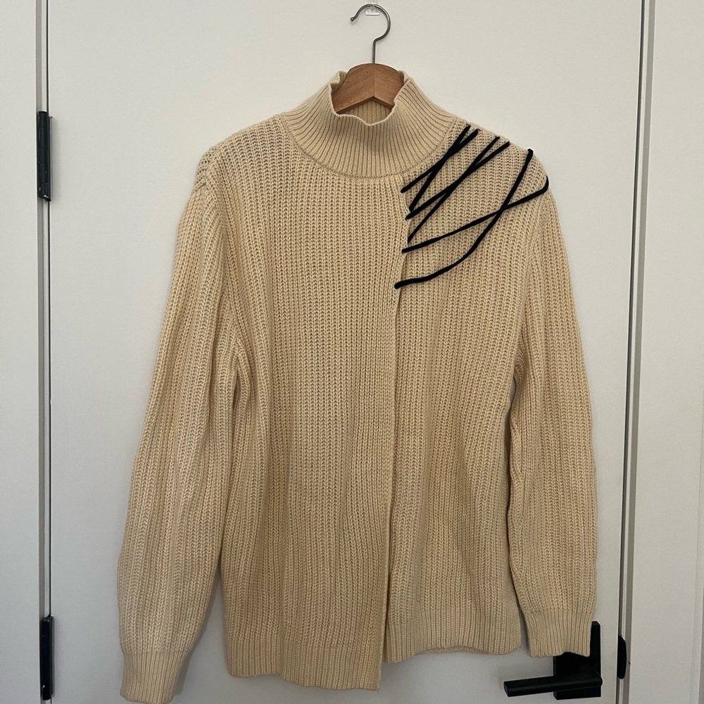 Elegant Cream Sweater with Black Accents